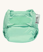 The Close Pop-In reusable cloth nappy with adjustable velcro, in mint green.