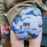 The Close Pop-In +bamboo reusable cloth nappy with adjustable velcro closures, in a purple moose print