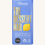 The Divine White Chocolate Lemon Cheesecake Dessert Bar in it's wrapping on a plain background.