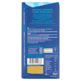 Back of Divine Fairtrade 45% Milk Chocolate Bar 90g in packaging pictured on  a plain white background