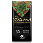 Divine Fairtrade Dark Chocolate Bar with Hazelnut Truffle 90g in packaging pictured on a plain white background