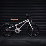 Early rider kids 14 inch belter bicycle in a dark workshop