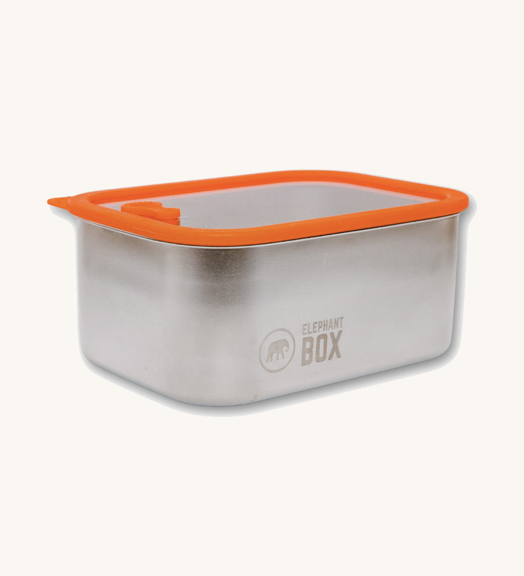 The Elephant Box Prep & Store medium food storage container with an orange silicone seal and see through glass lid.