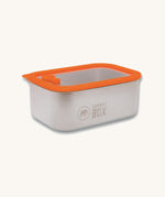The Elephant Box Small Prep & Store food storage container, with an orange silicone lid.