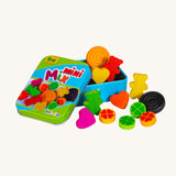 Erzi opened wooden jelly babies mix in a tin on a cream background.