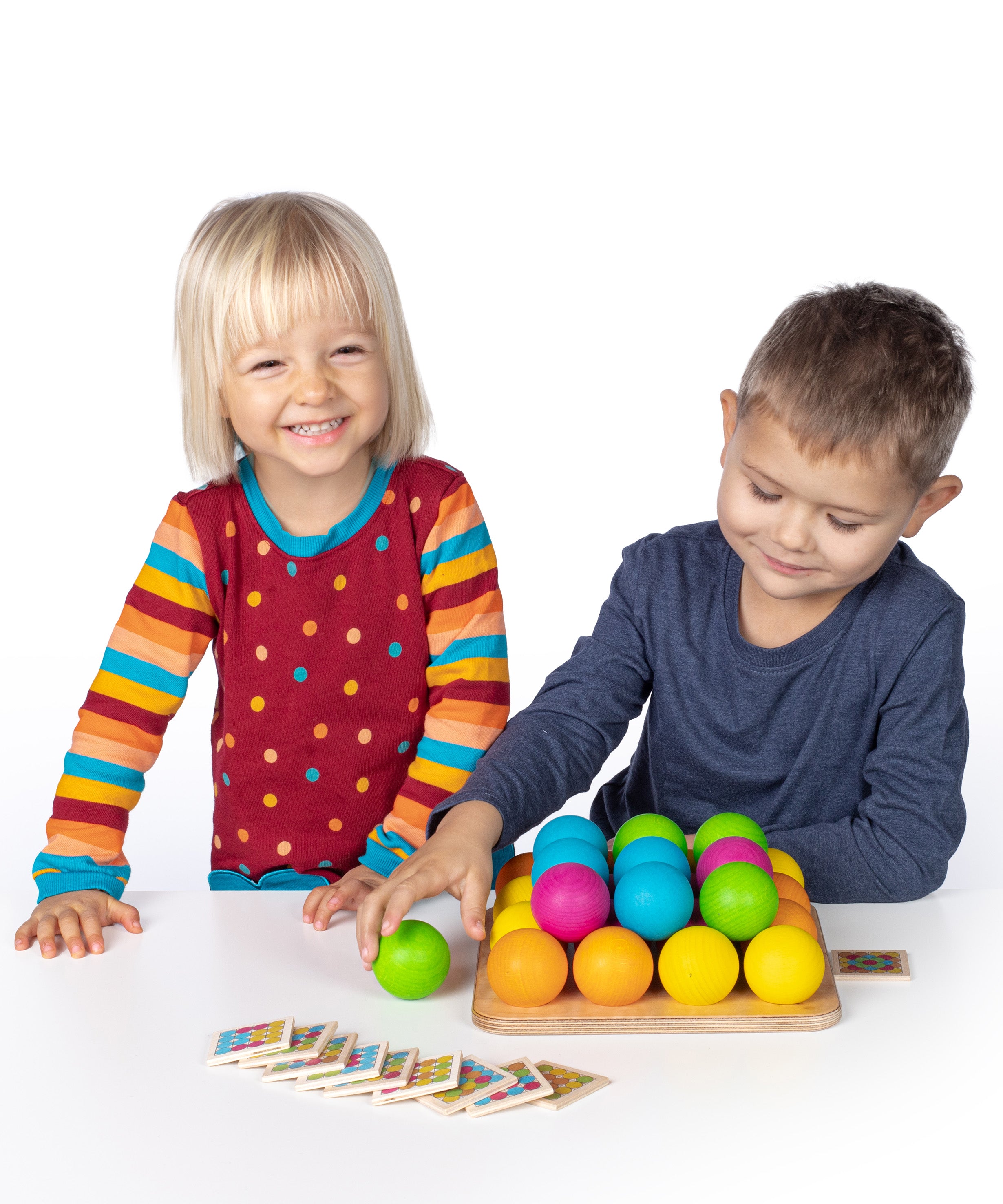 Erzi wooden multicoloured balls stacking game on a wooden base played with children