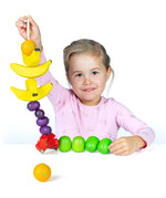 Erzi wooden threading fruits educational game played with a child