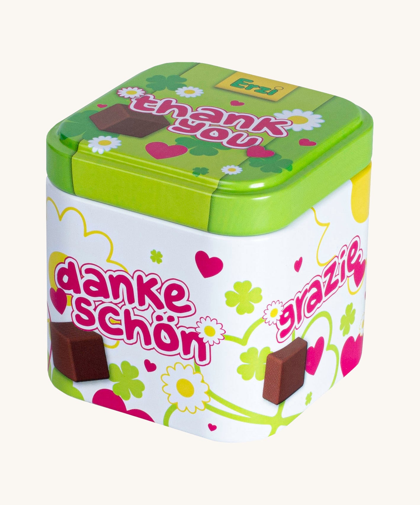 Erzi wooden chocolate cubes in a tin on a cream background.
