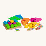 Erzi wooden multicoloured balls stacking game full set on a cream background