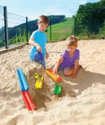 Erzi wooden water and marble run played with in the sand