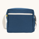 The classic navy coloured Fluf Crossbody Bag. The bag has and off white coloured zip an crossbody strap.