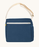The classic navy coloured Fluf Crossbody Bag. The bag has an off white coloured zip an crossbody strap.