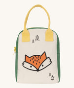 Fluf zip lunch bag in white and green with a design of a fox's head on the bottom with a yellow handle and zip detail on a cream background.
