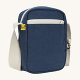Sleek and compact Fluf Mini Crossbody Bag in navy blue, organic cotton with recycled lining, machine washable, ideal for passports, keys and essentials on the go