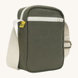 Sleek and compact Fluf Mini Crossbody Bag in olive green, organic cotton with recycled lining, machine washable, ideal for passports, keys and essentials on the go