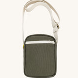 Olive green Fluf Mini Crossbody Bag made from GOTS certified organic cotton with recycled lining, sporty and stylish travel organiser with front zipper pocket and adjustable shoulder strap