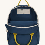 The organic cotton kids Fluf B-Pack Jr in navy blue, the backpack is unzipped.