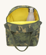 The Fluf organic cotton zippered lunch bag with a water bottle inside, in a green camo print with dark green handles and a yellow inside lining.
