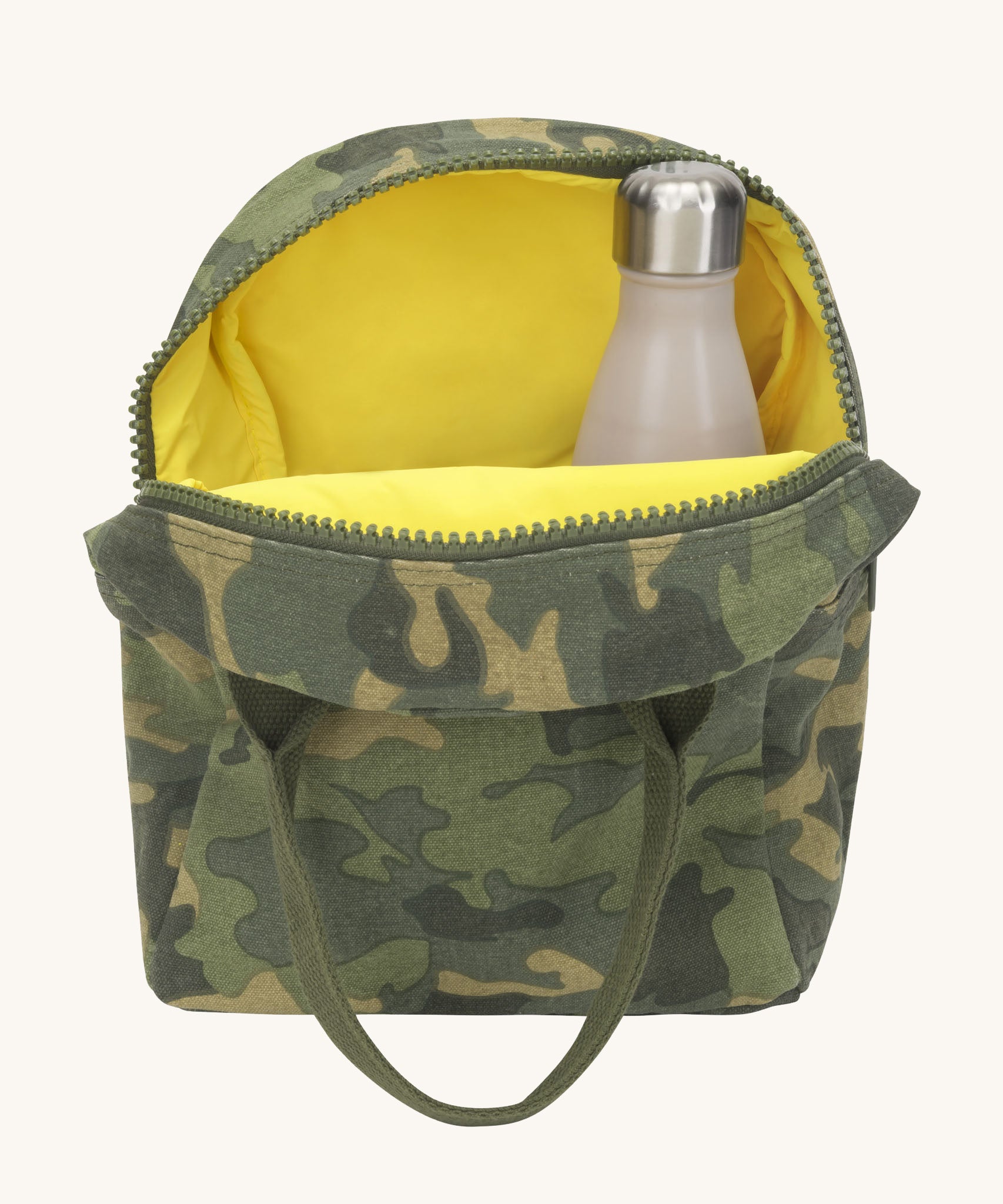 The Fluf organic cotton zippered lunch bag with a water bottle inside, in a green camo print with dark green handles and a yellow inside lining.