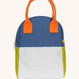 The Fluf organic cotton zippered lunch bag, featuring a two tone citrus sky design, orange handles and green side panels.