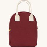 The Fluf organic cotton zippered lunch bag, in a vintage burgundy colour with white handles.