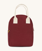 The Fluf organic cotton zippered lunch bag, in a vintage burgundy colour with white handles.