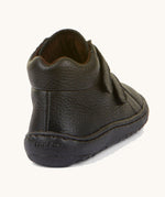 The back of a Froddo barefoot Autumn children's shoe in black available at Babipur showing the padded ankle and the matching black grippy sole detail