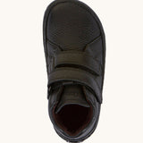 A top down image of a Froddo barefoot Autumn children's shoe in black available at Babipur showing the 2 velcro fastener for a secure fit and insole detail.