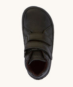 A top down image of a Froddo barefoot Autumn children's shoe in black available at Babipur showing the 2 velcro fastener for a secure fit and insole detail.