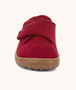 The front of the Froddo barefoot wooly children's shoe in Bordeaux showing the velcro fastener and brown grippy sole detail