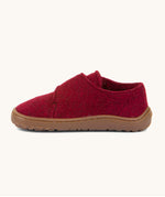 A side image of the Froddo barefoot wooly children's shoe in Bordeaux available at Babipur showing the velcro fastener for a secure fit and a dark brown grippy sole