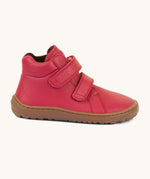 A side image of a Froddo barefoot Autumn children's shoe in dark red available at Babipur showing the 2 velcro fastener padded ankle support and the dark brown grippy sole detail