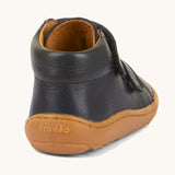 The back of the Froddo barefoot first step baby shoe in dark blue available at Babipur showing the padded ankle support and grippy sole detail