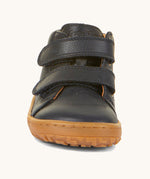 The front of the Froddo barefoot first step baby shoe in dark blue available at Babipur showing the 2 velcro fastener for a secure fit and the grippy sole detail