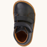 A top down image of the Froddo barefoot first step baby shoe in dark blue available at Babipur showing the 2 velcro fasteners and inner sole detail