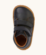 A top down image of the Froddo barefoot first step baby shoe in dark blue available at Babipur showing the 2 velcro fasteners and inner sole detail