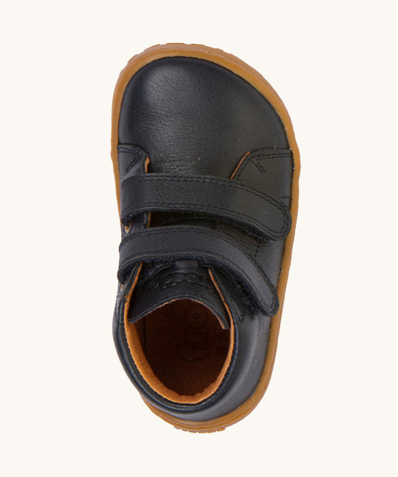 A top down image of the Froddo barefoot first step baby shoe in dark blue available at Babipur showing the 2 velcro fasteners and inner sole detail