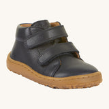 Froddo barefoot first step baby shoe in dark blue. A natural leather shoe with a 2 velcro fastener for a secure fit and a grippy sole