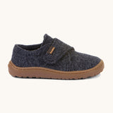 A side image of the Froddo barefoot wooly children's shoe in dark blue available at Babipur showing the velcro fastener dark brown grippy sole detail