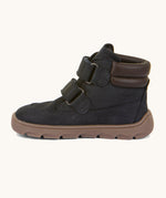 A side image of the Froddo barefoot Zuru tex children's shoe in dark blue available at Babipur showing the 2 velcro fasteners, padded ankle support and the dark brown grippy sole detail