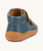 The back of the Froddo barefoot first step baby shoe in dark denim available at Babipur showing padded ankle support and brown grippy sole detail