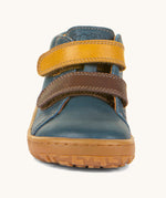The front of the Froddo barefoot first step baby shoe in dark denim available at Babipur showing the 2 velcro fastener in dark yellow and brown for a secure fit.