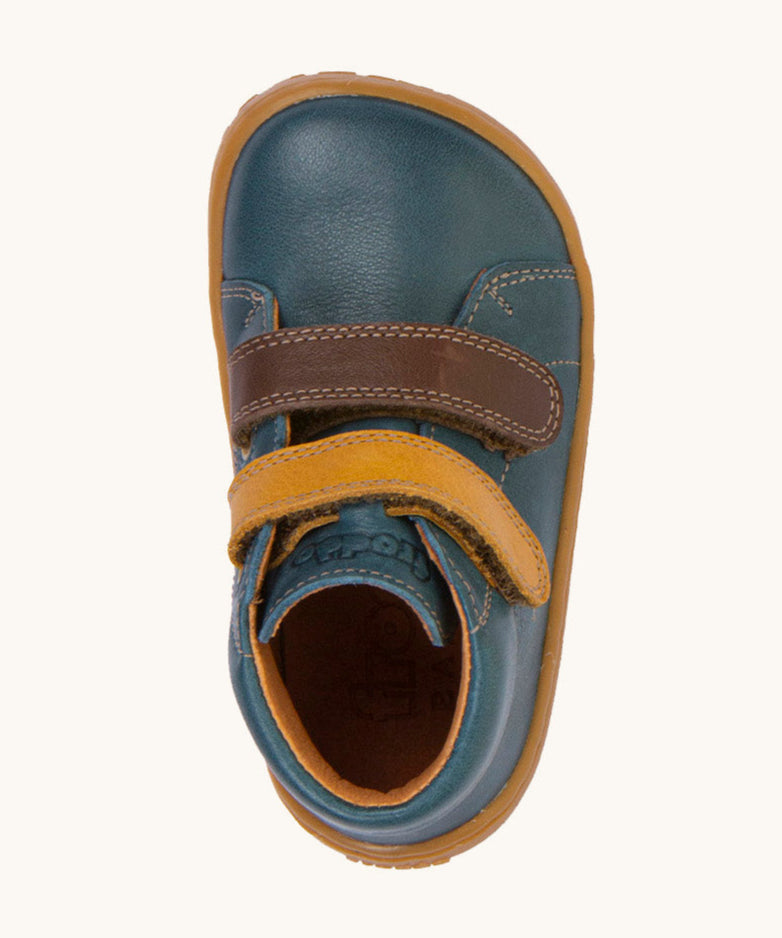 A top down image of the Froddo barefoot first step baby shoe in dark denim available at Babipur showing the 2 velcro fasteners and inner sole detail