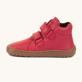 A side image of a Froddo barefoot Autumn children's shoe in dark red available at Babipur showing the 2 velcro fastener for a secure fit, padded ankle and the dark brown grippy sole