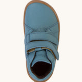 A top down image of a Froddo barefoot Autumn children's shoe in light blue denim colour available at Babipur showing the 2 velcro fastener for a secure fit and insole detail.