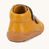 The back of the Froddo barefoot first step baby shoe in mustard available at Babipur showing padded ankle support and brown grippy sole detail