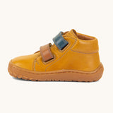 Froddo barefoot first step baby shoe in mustard available at Babipur showing the 2 velcro fastener for a secure fit in blue and brown and the grippy sole