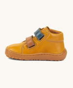 Froddo barefoot first step baby shoe in mustard available at Babipur showing the 2 velcro fastener for a secure fit in blue and brown and the grippy sole