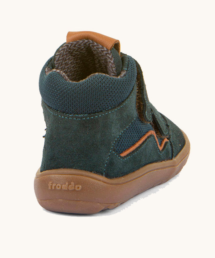 The back of the  Froddo barefoot Tex Autumn children's shoe in petroleum available at Babipur. A dark turquoise shoe showing the padded ankle support and the brown grippy sole detail