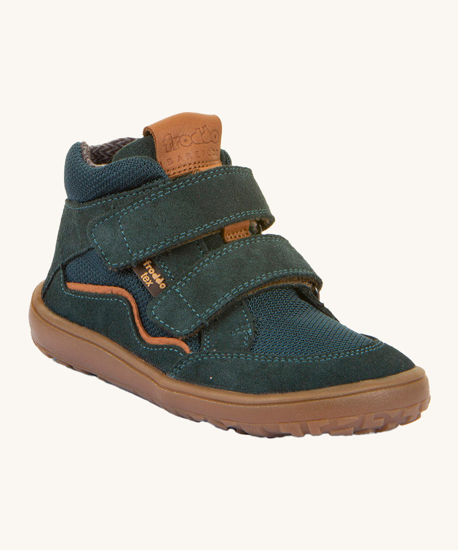 Froddo barefoot Tex Autumn children's shoe in petroleum available at Babipur. A dark turquoise shoe with 2 velcro fasteners on the front for a secure fit, padded ankle and a brown grippy sole.